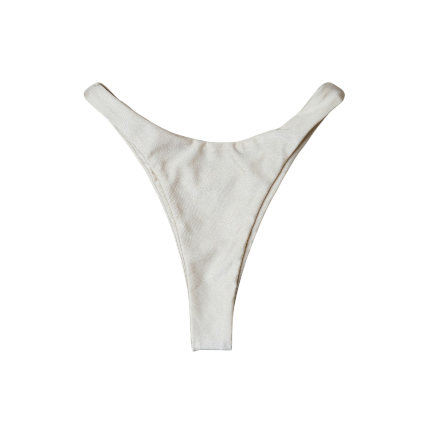 Cream Aláti Delfini high-cut thong bikini bottom, back flat-lay, with thong rear