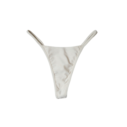 Cream Aláti Ola high-cut thong bikini bottom, front flat-lay, with slim fixed sides