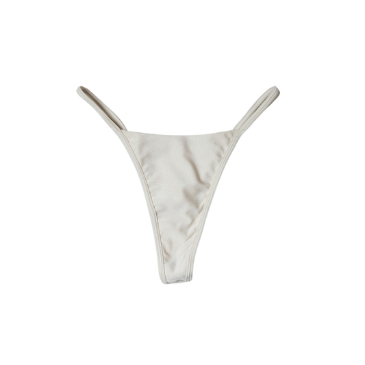 Cream Aláti Ola high-cut thong bikini bottom, front flat-lay, with slim fixed sides