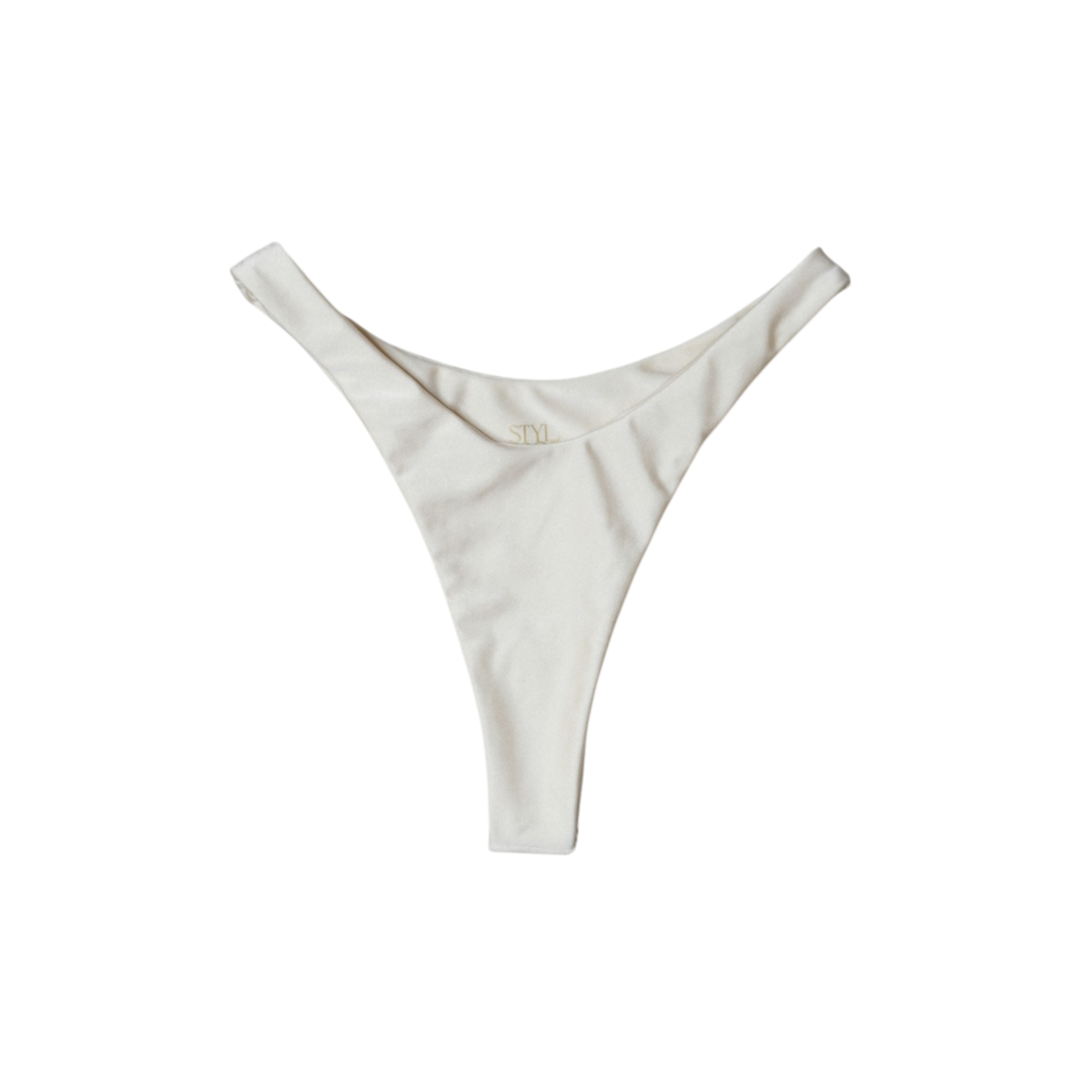 Cream Aláti Delfini high-cut thong bikini bottom, front flat-lay, with V-shaped waist and gold logo